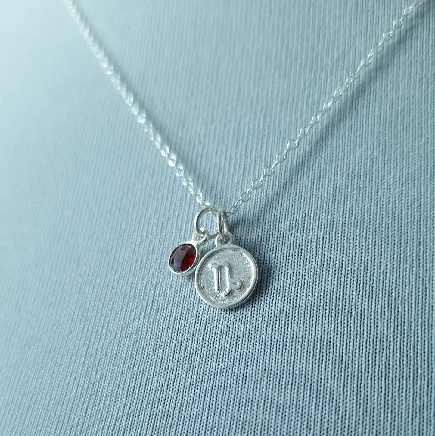 Capricorn Garnet charm necklace in sterling silver