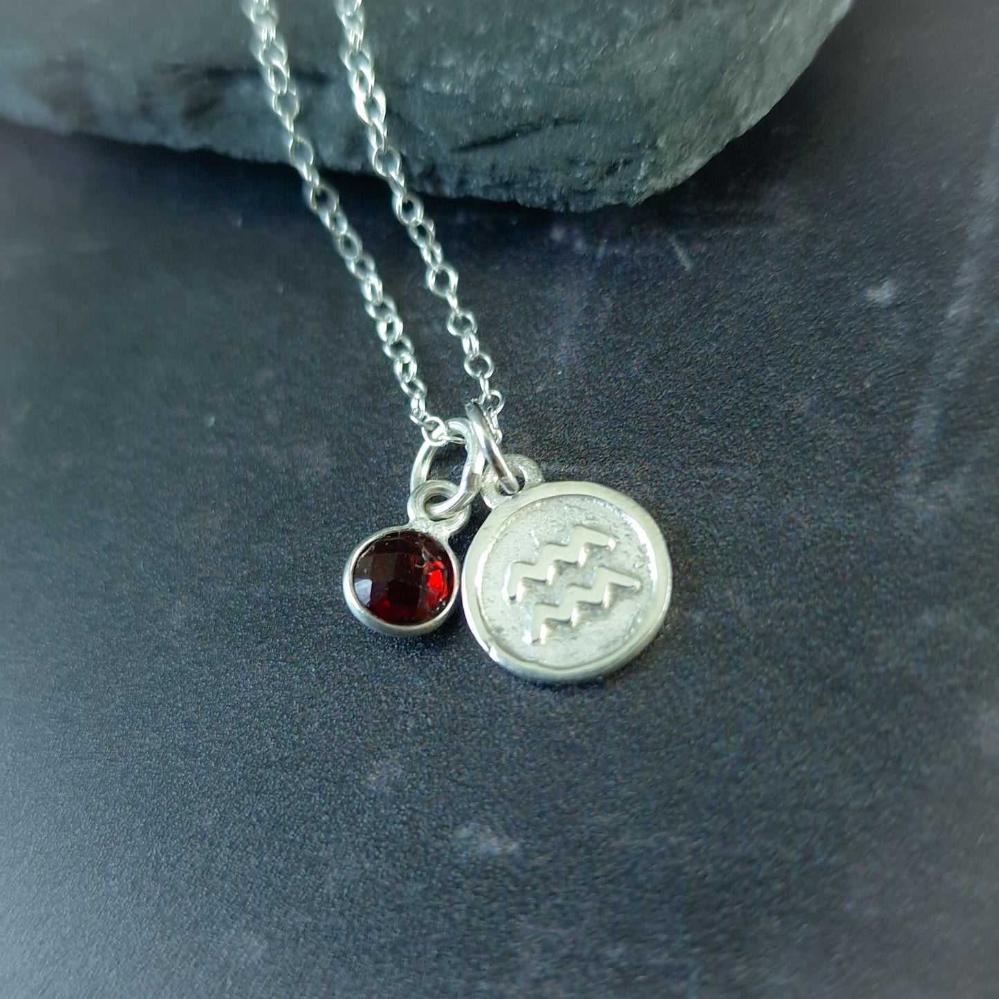 Aquarius and garnet double pendant necklace in sterling silver