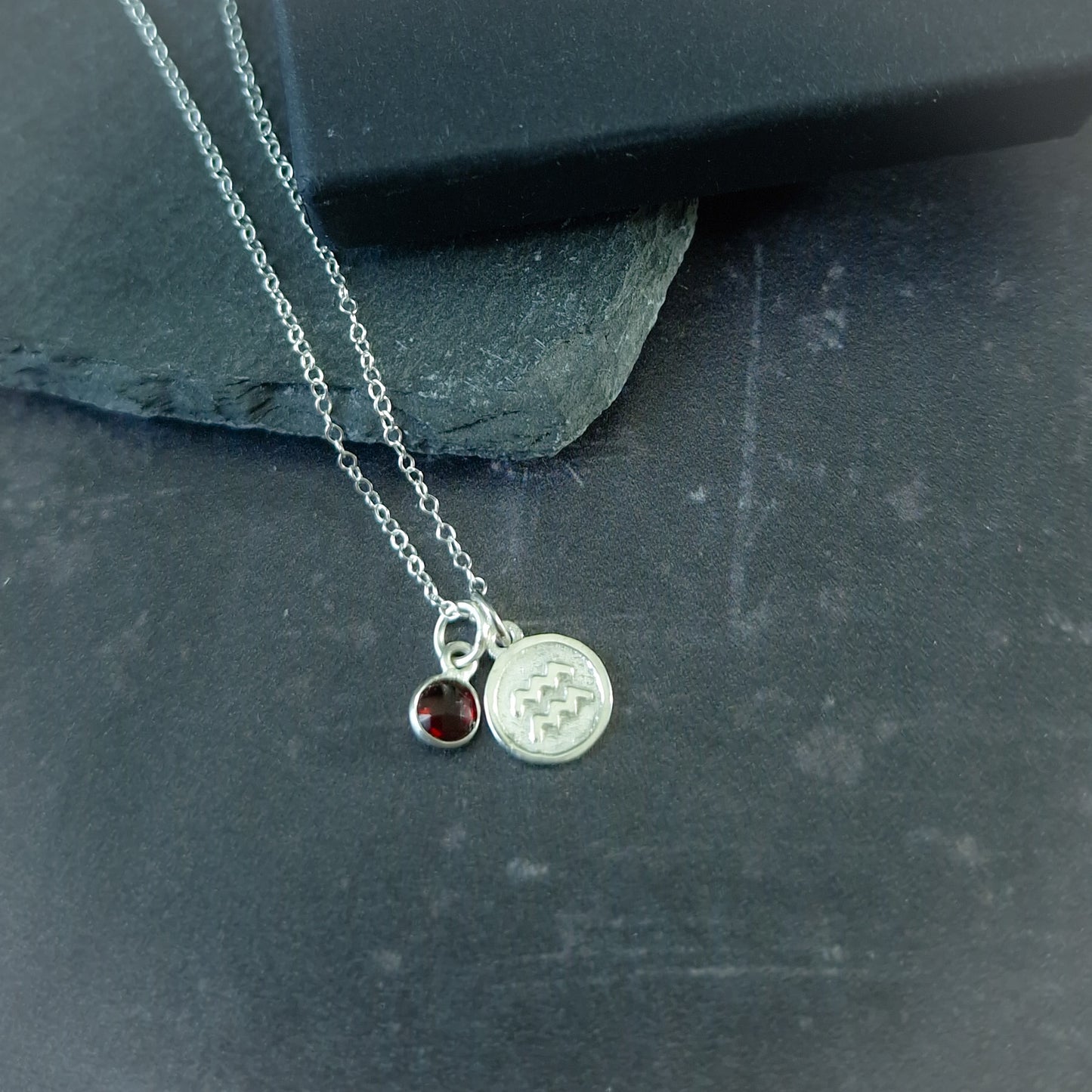 Aquarius and garnet double pendant necklace in sterling silver