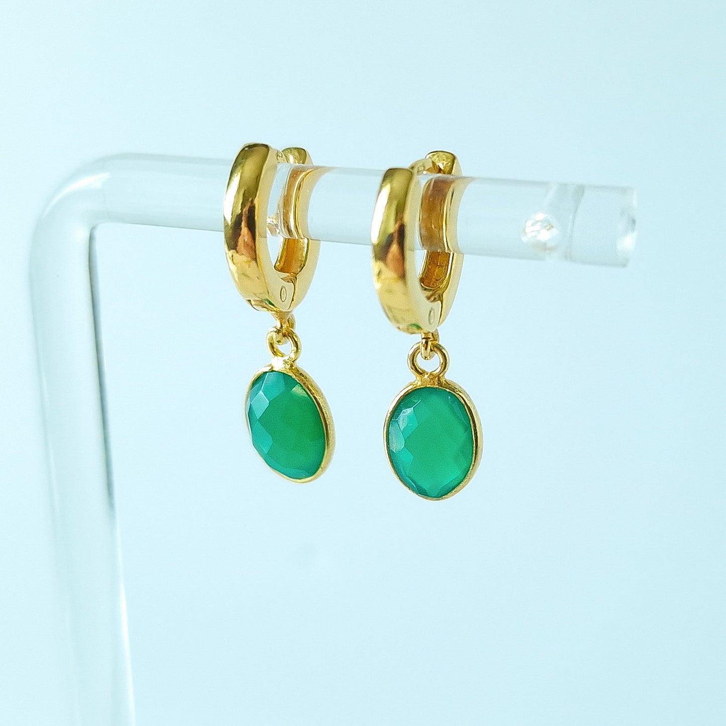 Green Onyx Huggie Hoop Earrings in Gold Vermeil Silver - dainty facetted oval green Onyx gemstones hang off gold vermeil silver huggie hoop earrings.