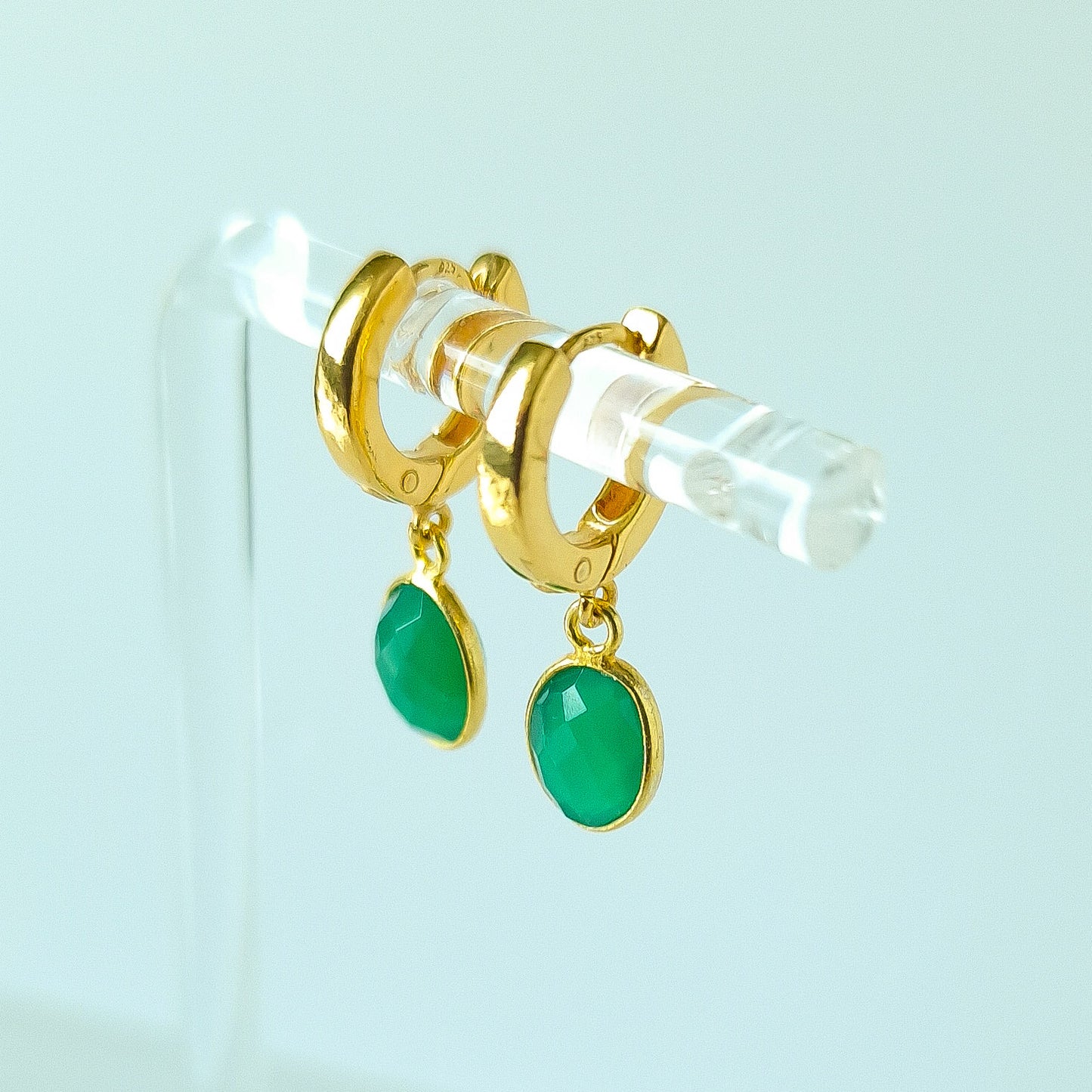 Green Onyx Huggie Hoop Earrings in Gold Vermeil Silver - dainty facetted oval green Onyx gemstones hang off gold vermeil silver huggie hoop earrings.