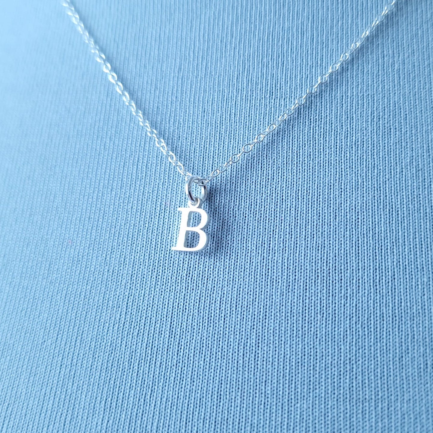 Close up of Sterling Silver Initial Alphabet Necklace