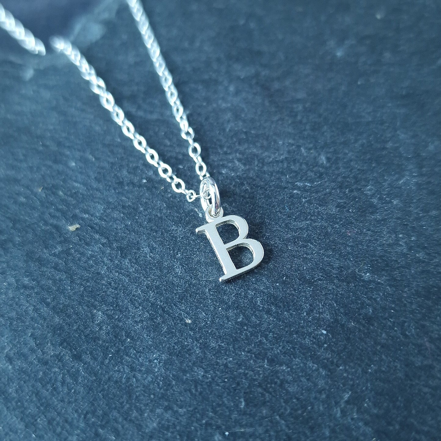 Close up of Sterling Silver Initial Alphabet Necklace