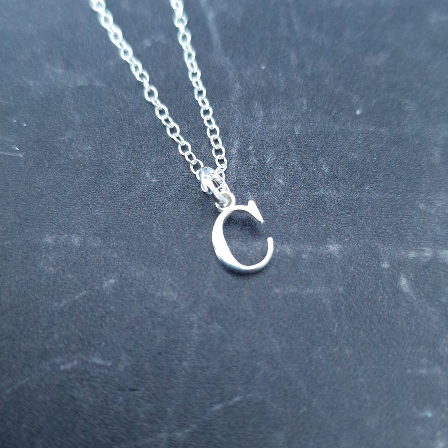Close up of Sterling Silver Initial Alphabet Necklace