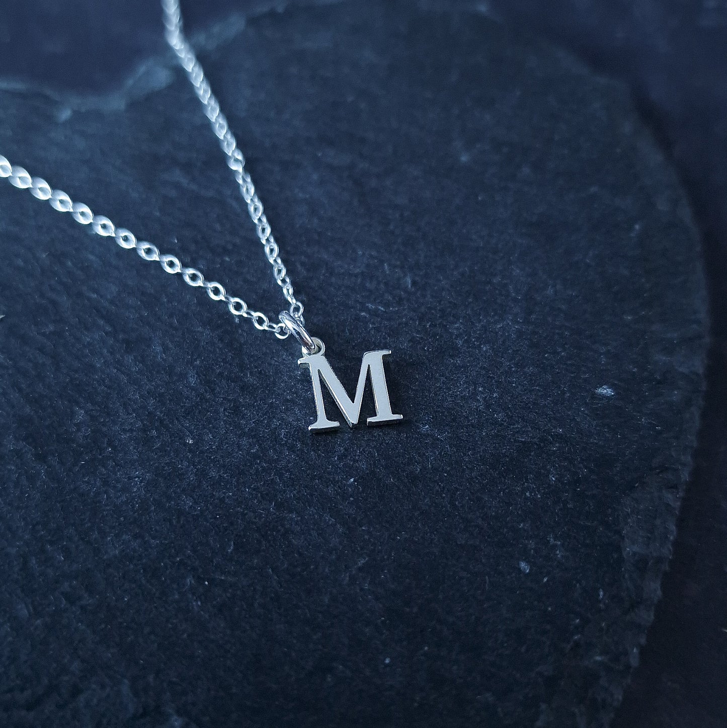 Close up of Sterling Silver Initial Alphabet Necklace