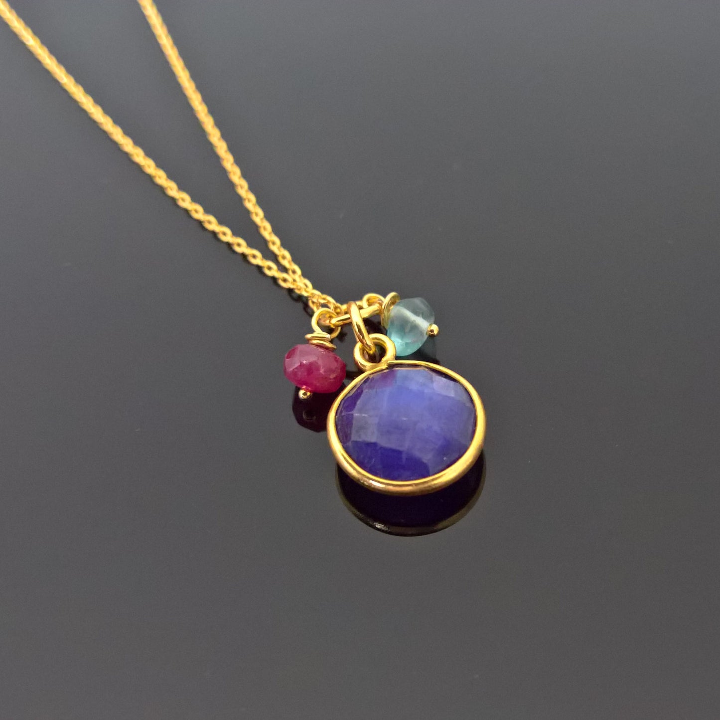 Blue sapphire circle pendant necklace in gold vermeil silver