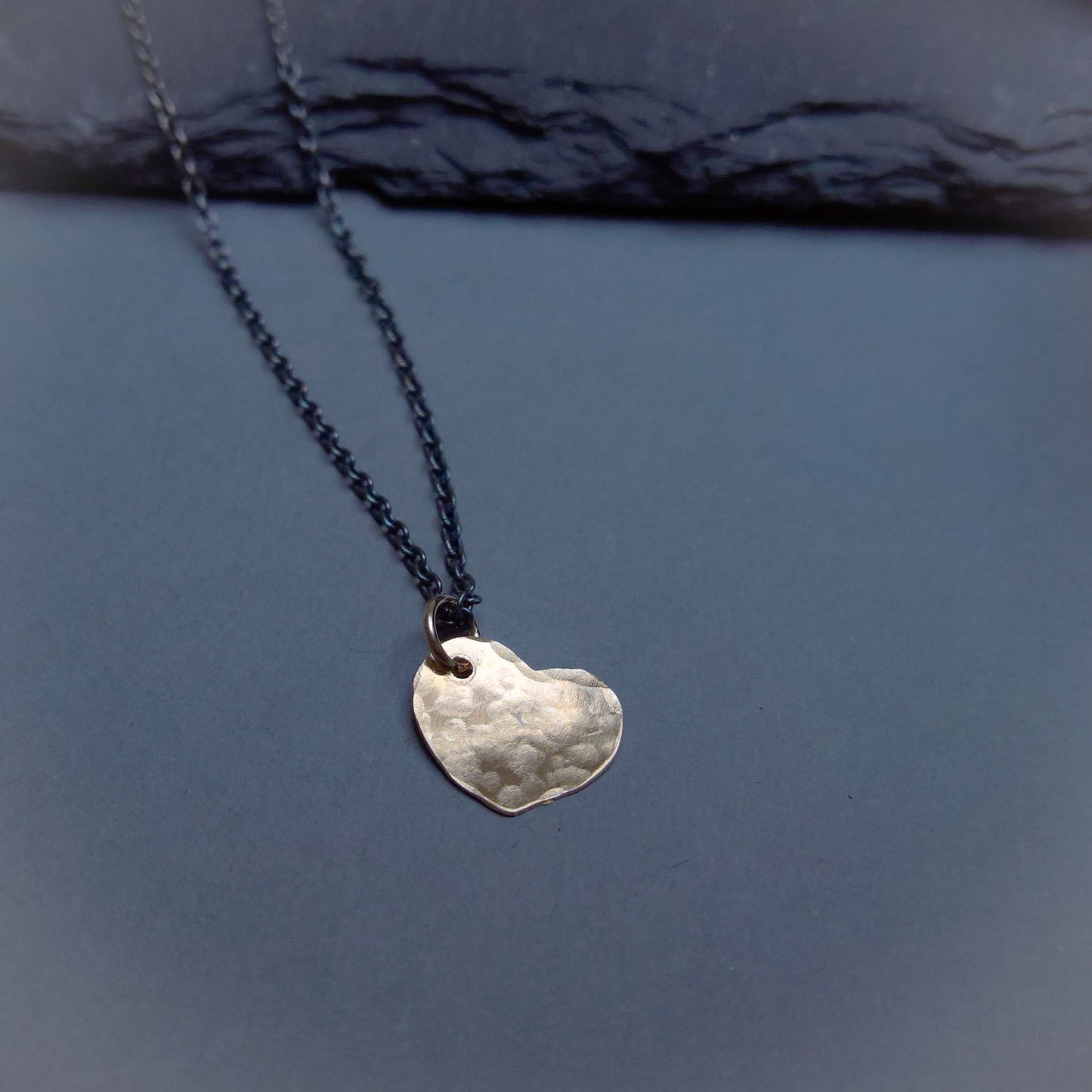 Dainty gold heart pendant on oxidized silver chain necklace
