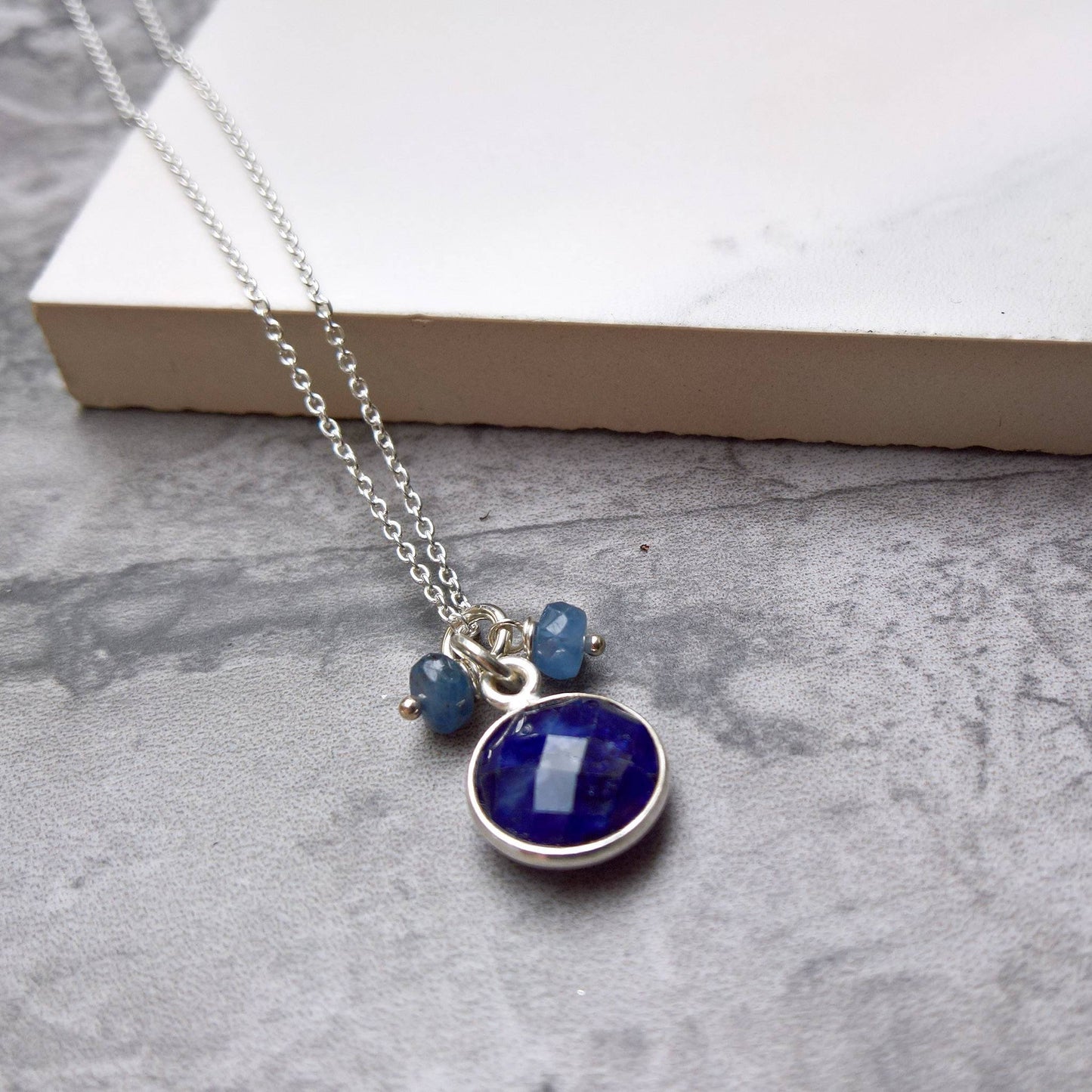 Blue sapphire pendant necklace in sterling silver