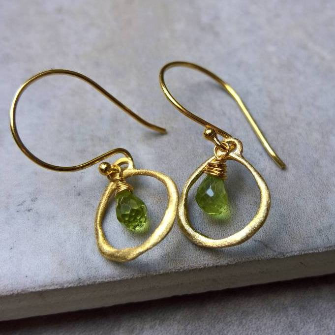 Close up of pair of peridot drop earrings - Marie Nicole Bijoux