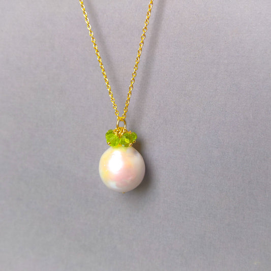 Large Round Pearl with peridot gemstone cluster of beads dangling off a gold vermeil chain