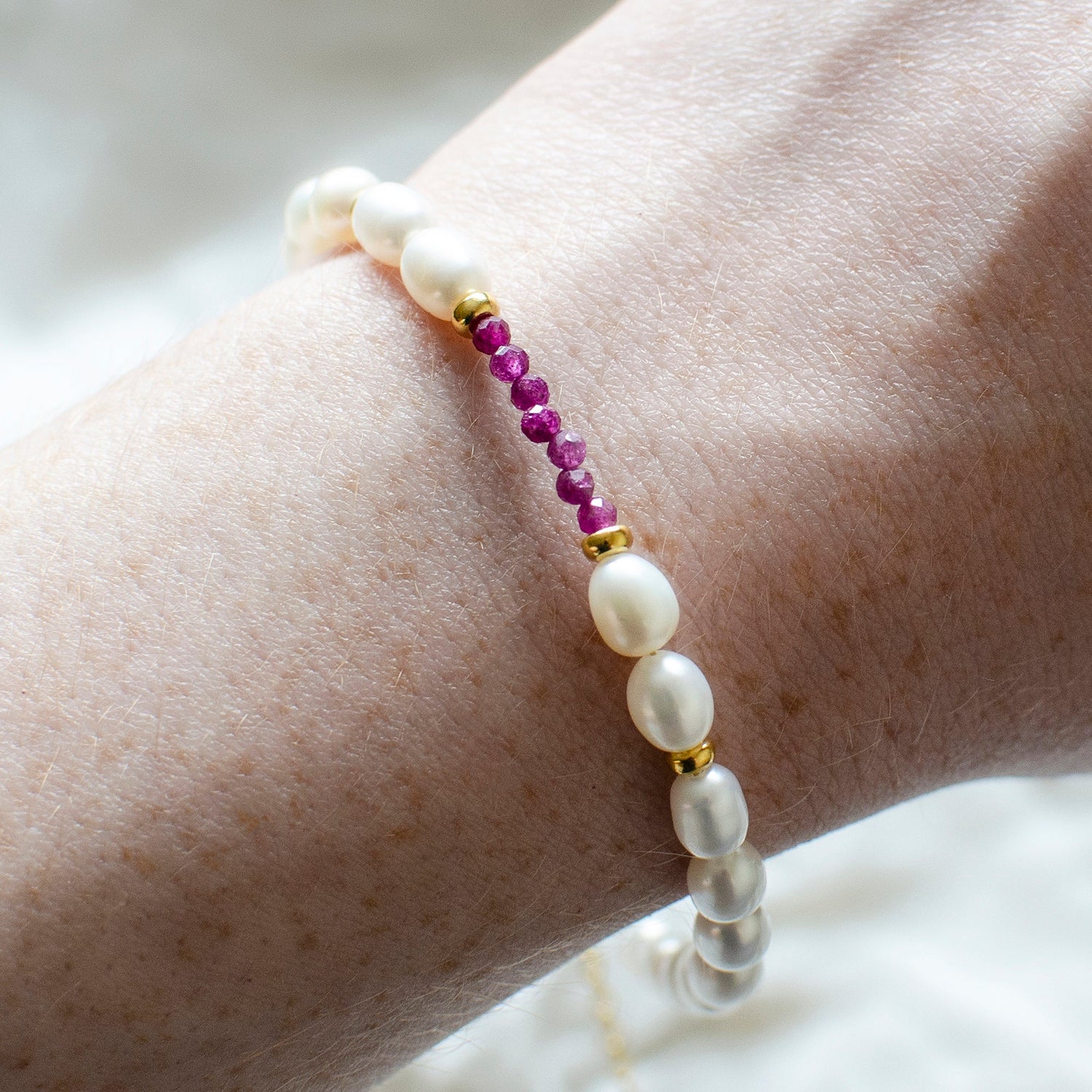 Marie Nicole Bijoux | ruby and pearl bracelet with gold vermeil silver accents