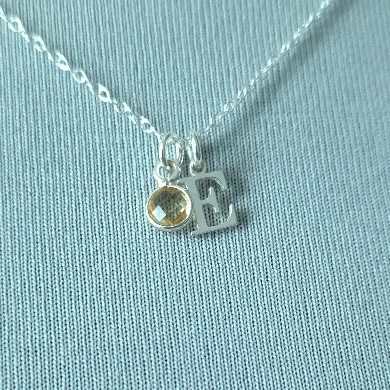 Close up of Citrine and Sterling Silver Initial Pendant Necklace