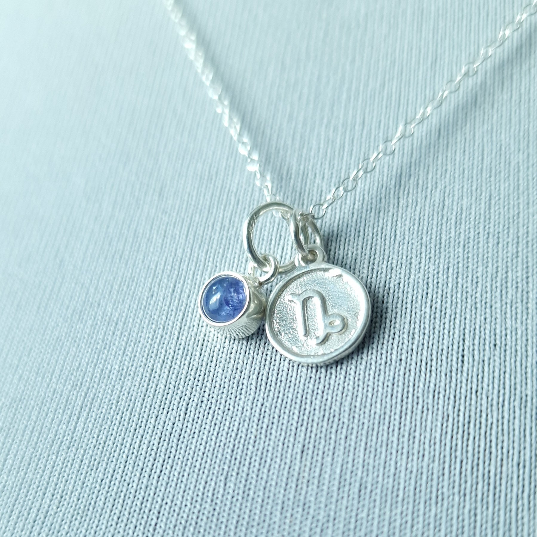 Capricorn Tanzanite charm necklace in sterling silver