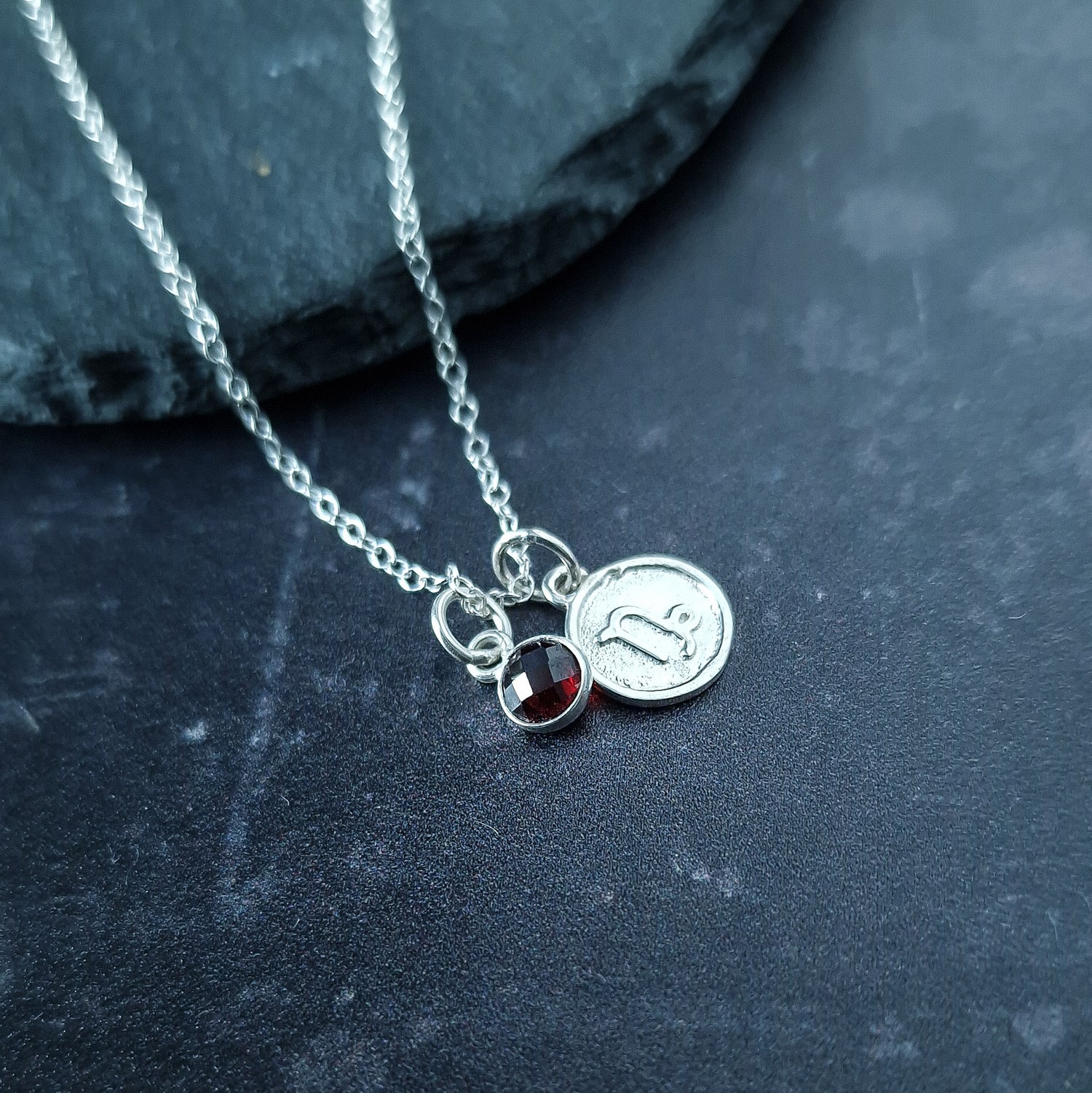 Capricorn Garnet charm necklace in sterling silver