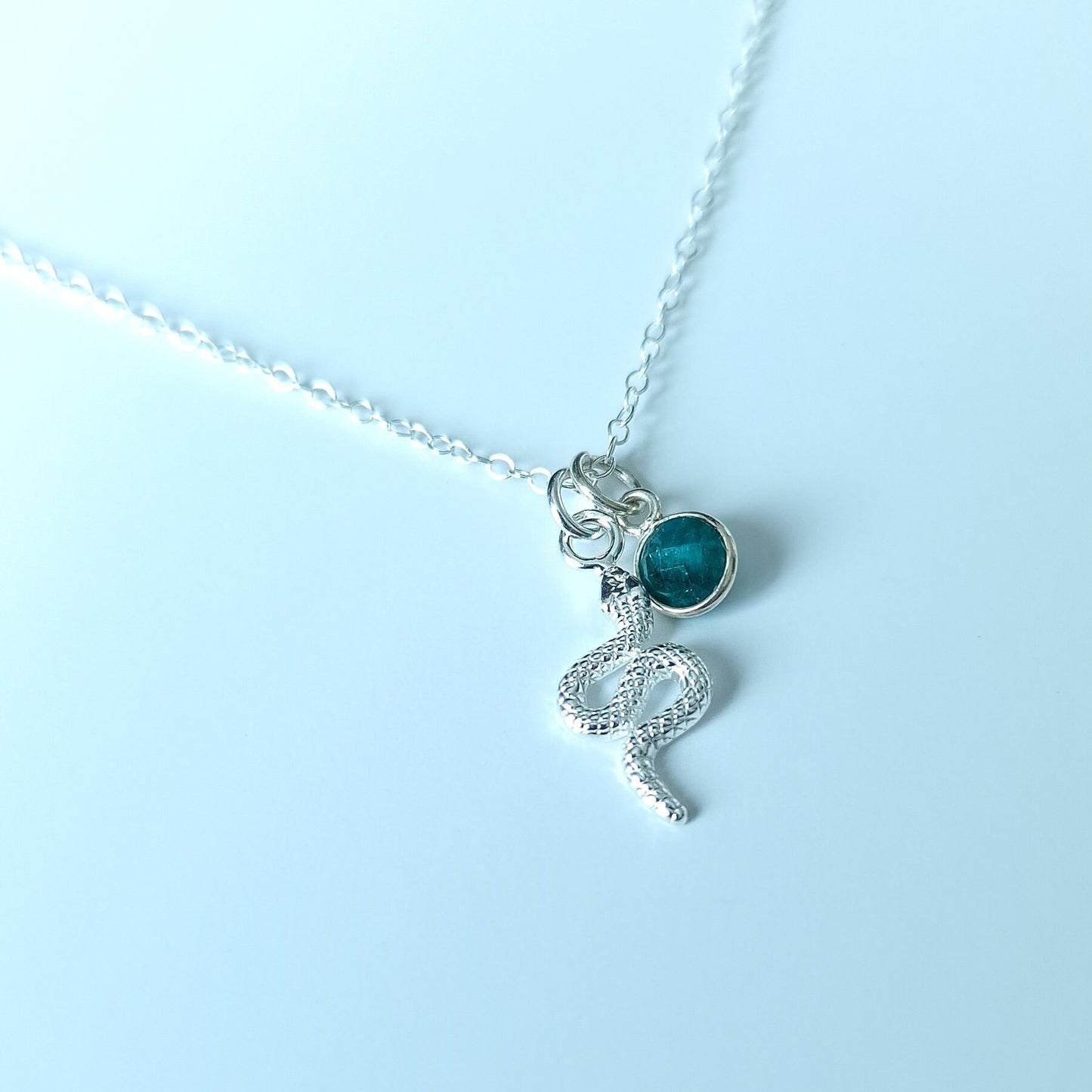 Snake pendant necklace sterling silver with Emerald birthstone pendant