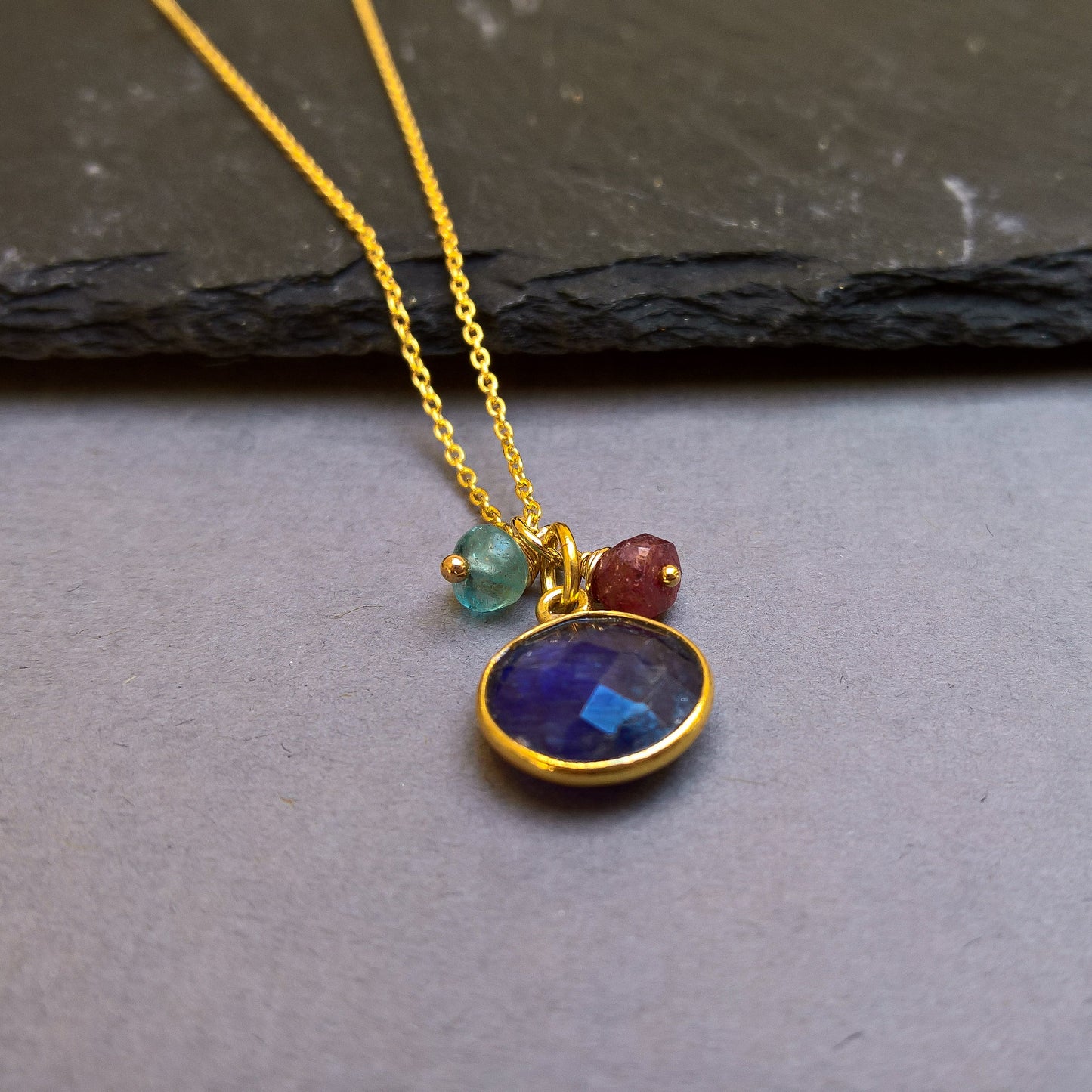 Blue sapphire circle pendant necklace in gold vermeil silver