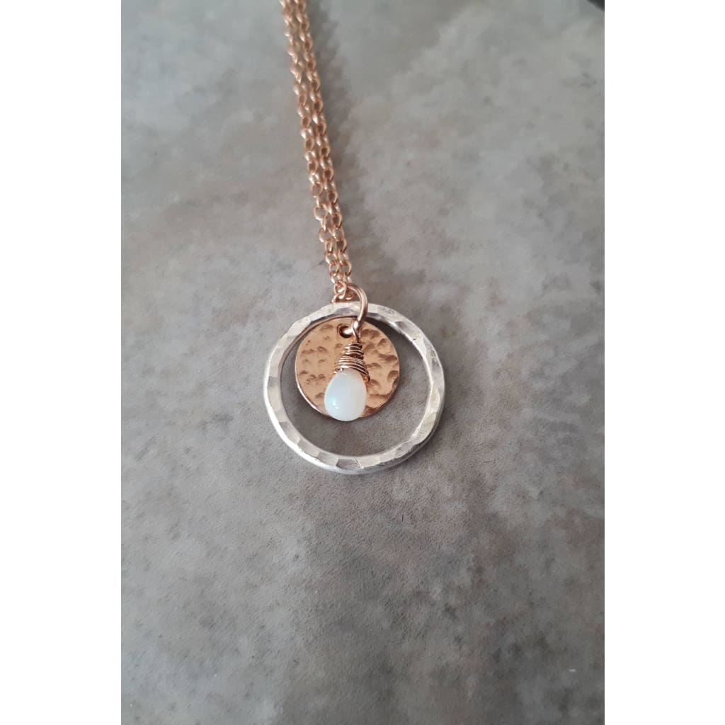Rose gold and silver circle necklace with opal pendant